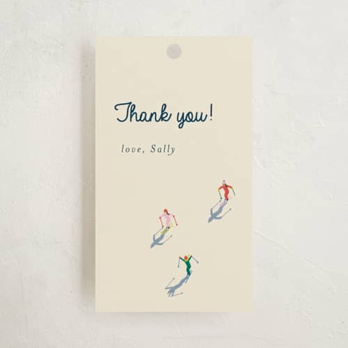 This is a cream baby shower favor tags with standard by Ellen Schlegelmilch called apres bebe printing on signature in tag