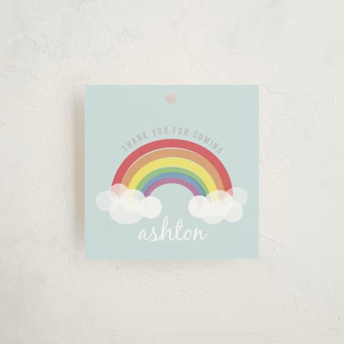 This is a soft teal kids gift tags with standard by Angela Garrick called rainbow celebration printing on signature in tag