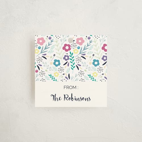 This is a cream gift tags with standard by Rebecca Humphreys called sweet arrivals printing on signature in tag