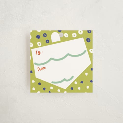 This is a jade gift tags with standard by Ariel Rutland called dreidel dance printing on signature in tag