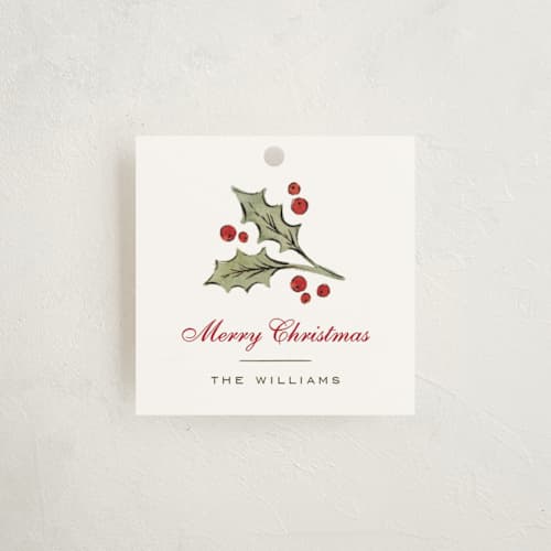 This is a cranberry gift tags with standard by Wildfield Paper Co called holly monogram printing on signature in tag