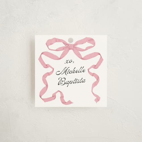 This is a petal gift tags with standard by Olivia Kanaley Inman called antique ribbon printing on signature in tag