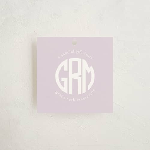 This is a lavender gift tags with standard by Jelena Vuletic called roundel printing on signature in tag