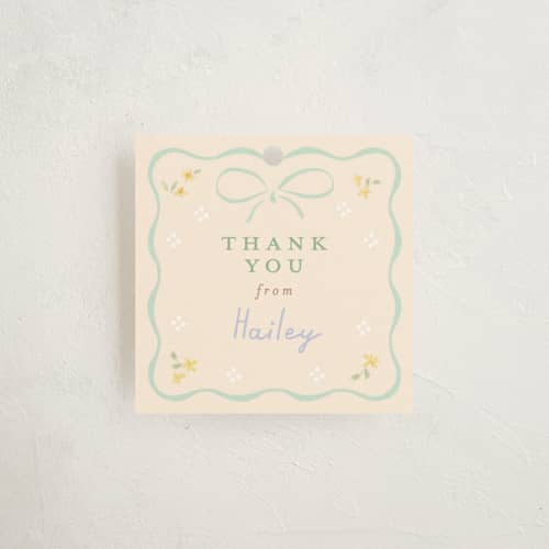 This is a seafoam baby shower favor tags with standard by Jennifer Wick called petite corners printing on signature in tag