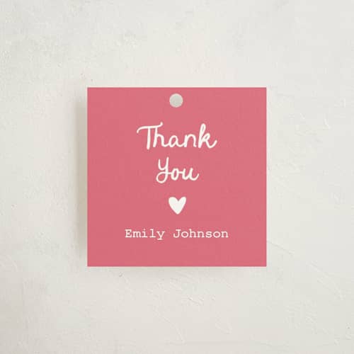 This is a peony baby shower favor tags with standard by Ilene Guy called build a library printing on signature in tag