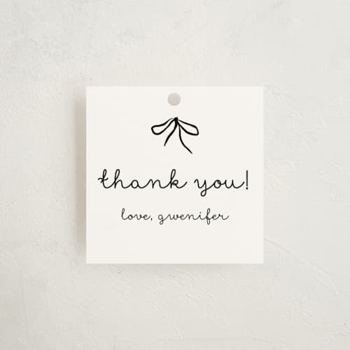 This is a cotton baby shower favor tags with standard by Deynaaz Daraei called okarche printing on signature in tag