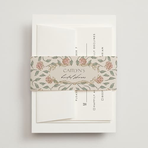 This is a blush meadow belly bands with standard by Grae called dancing in the garden printing on signature text in belly band