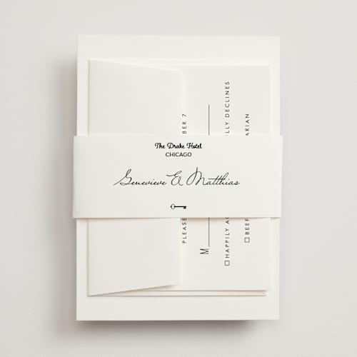 This is a ivory belly bands with standard by Studio Suku called hotel printing on signature text in belly band