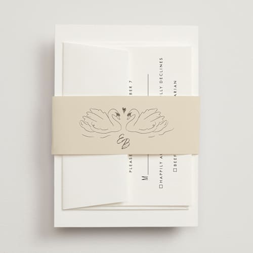 This is a buttercream belly bands with standard by Helena Vitto called the swan printing on signature text in belly band