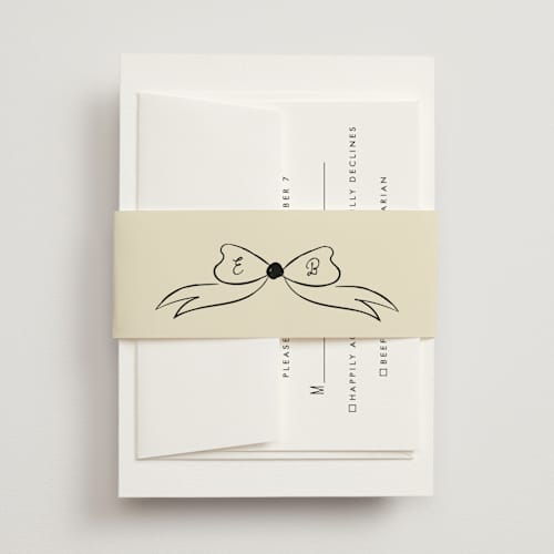 This is a champagne belly bands with standard by Helena Vitto called modern love printing on signature text in belly band