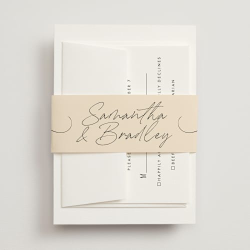 This is a champagne belly bands with standard by Wallace Design Co. called french whimsy script printing on signature text in belly band