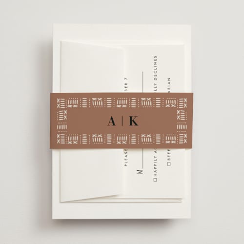 This is a ivory belly bands with standard by Oma N. Ramkhelawan called amari printing on signature text in belly band