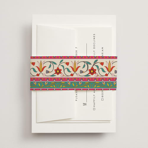 This is a ivory belly bands with standard by Sherley Ferreira called mughal gardens printing on signature text in belly band