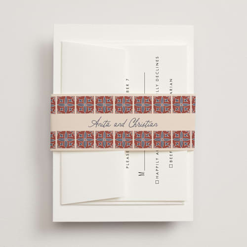 This is a terracotta belly bands with standard by Katharine Watson called block print tile printing on signature text in belly band