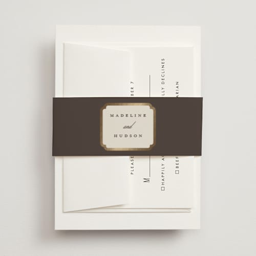 This is a cognac belly bands with foil pressed by Emily Betts called arch frame printing on signature text in belly band