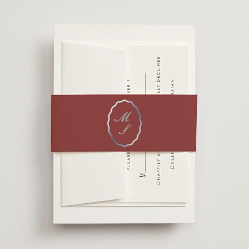 This is a burgundy belly bands with foil pressed by Baumbirdy called scallop frame printing on signature text in belly band