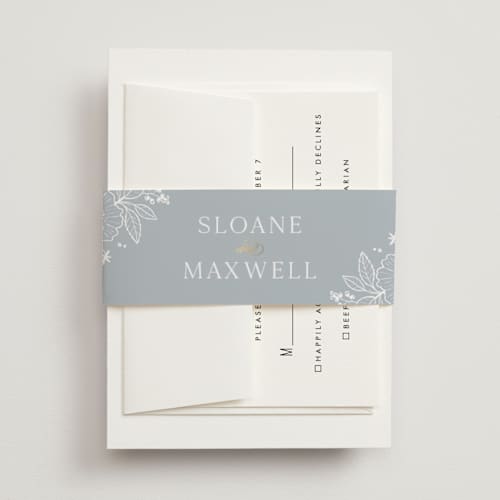 This is a powder blue belly bands with foil pressed by Kristen Smith called wild roses printing on signature text in belly band