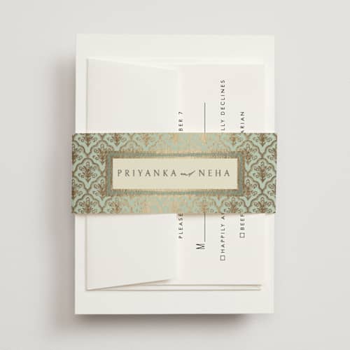 This is a aqua belly bands with foil pressed by Pati Cascino called aatreya printing on signature text in belly band