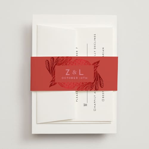 This is a ruby belly bands with foil pressed by Ghia Designs called fiery printing on signature text in belly band