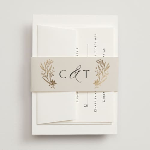 This is a champagne belly bands with foil pressed by Leah Bisch called floral border printing on signature text in belly band