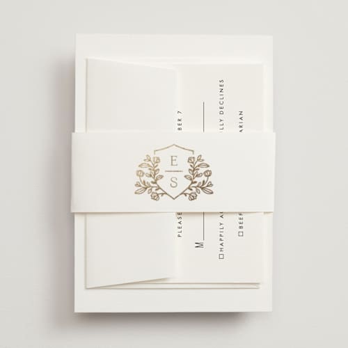 This is a ivory belly bands with foil pressed by Mansi Verma called gold crest printing on signature text in belly band