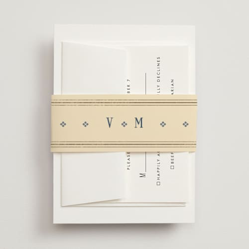 This is a navy belly bands with foil pressed by Baumbirdy called woven printing on signature text in belly band