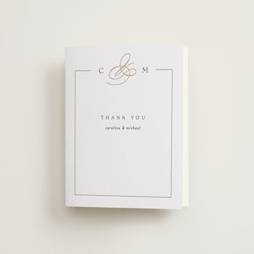 This is a saffron wedding thank you cards with letterpress by Kelly Schmidt called framed monogram printing on coventry320 in standard