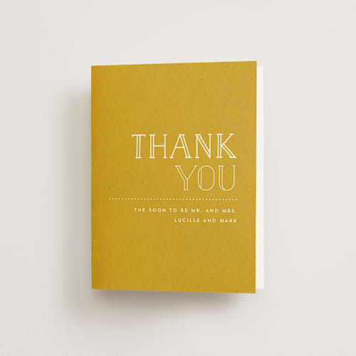 This is a brass wedding thank you cards with standard by Roxy Cervantes called golden ticket printing on strathmore in standard