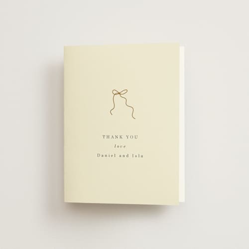 This is a cream wedding thank you cards with standard by Baumbirdy called bows printing on strathmore in standard