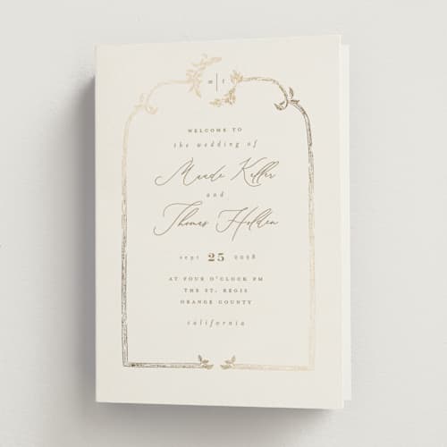 This is a porcelain unique wedding programs with foil pressed by Leah Bisch called reflection printing on signature in folded