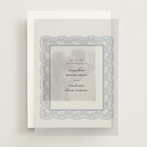 This is a dusty blue vellum overlays with standard by Erica Krystek called chantilly printing on translucent vellum in overlay