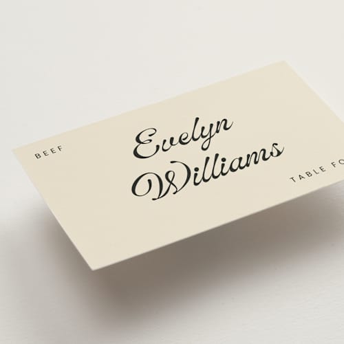 This is a cream wedding place cards with standard by Stacy Maalouf called vintage printing on signature in placecard