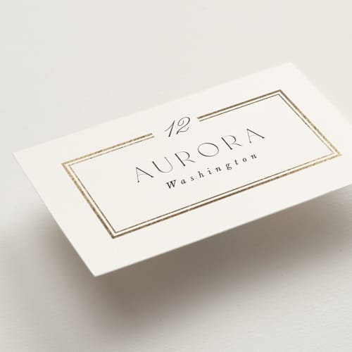 This is a pearl wedding place cards with foil pressed by Leah Bisch called elegant type printing on signature in placecard