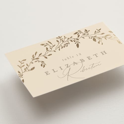 This is a sand wedding place cards with foil pressed by Creo Study called leafy garland printing on signature in placecard
