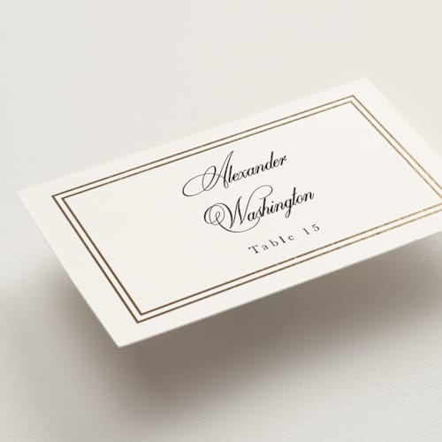 This is a snow wedding place cards with foil pressed by Sarah Brown called traditionalist printing on signature in placecard