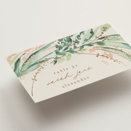 This is a greenery wedding place cards with foil pressed by Phrosné Barwood called fresh tropical printing on signature in placecard