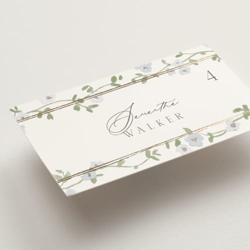 This is a blue bell wedding place cards with foil pressed by Everett Paper Goods called portico printing on signature in placecard