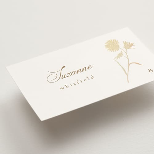 This is a buttercream wedding place cards with foil pressed by Kristie Kern called the romantic printing on signature in placecard
