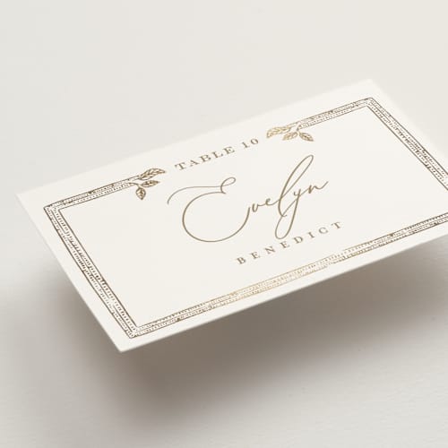 This is a porcelain wedding place cards with foil pressed by Leah Bisch called reflection printing on signature in placecard