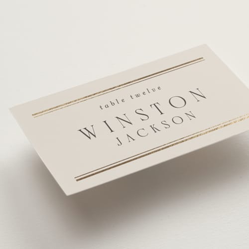 This is a champagne wedding place cards with foil pressed by Nicole Walsh called grace printing on signature in placecard