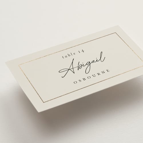 This is a linen wedding place cards with foil pressed by Pippa Shaw called silk printing on signature in placecard