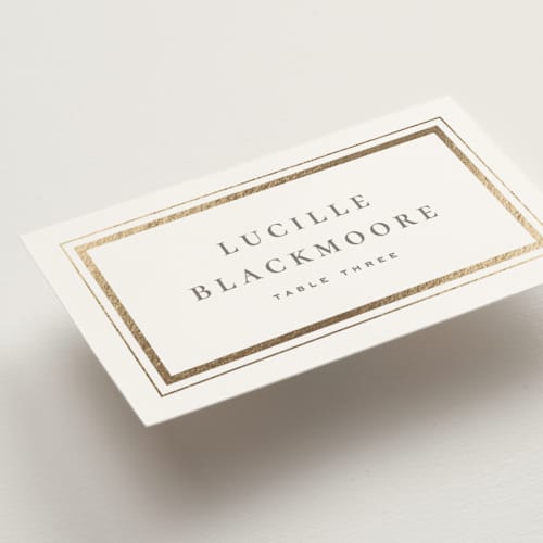 This is a chantilly wedding place cards with foil pressed by Wildfield Paper Co called hampton printing on signature in placecard