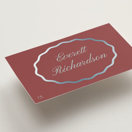 This is a burgundy wedding place cards with foil pressed by Baumbirdy called scallop frame printing on signature in placecard