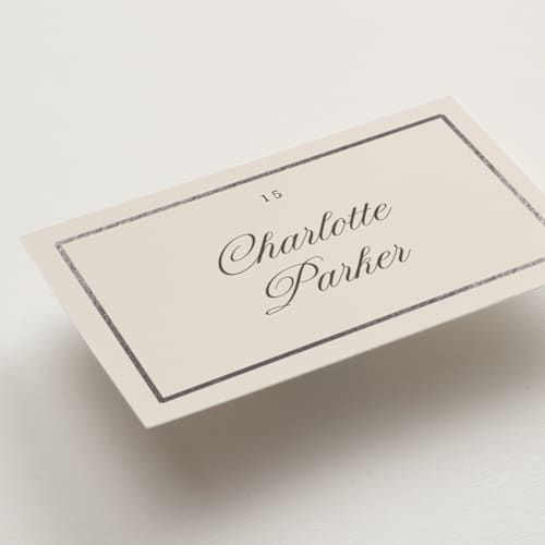 This is a antique wedding place cards with foil pressed by Nicole Walsh called tux printing on signature in placecard