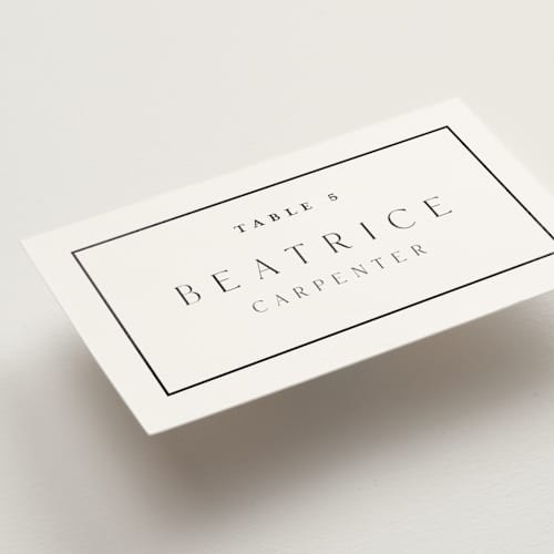 This is a cotton wedding place cards with foil pressed by Stacey Meacham called warm affection printing on signature in placecard