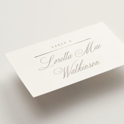This is a chantilly wedding place cards with foil pressed by Wildfield Paper Co called romantic wreath printing on signature in placecard