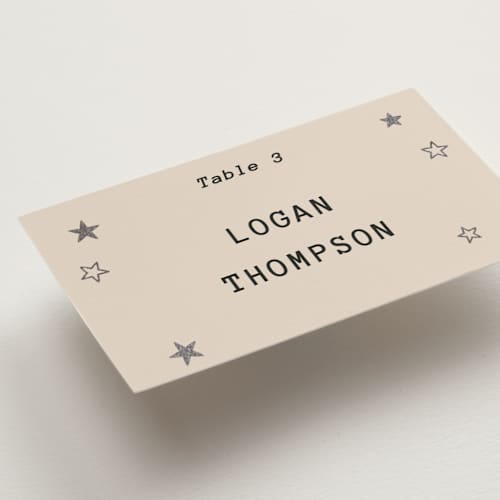 This is a ecru wedding place cards with foil pressed by Jennifer Lew called supernova printing on signature in placecard