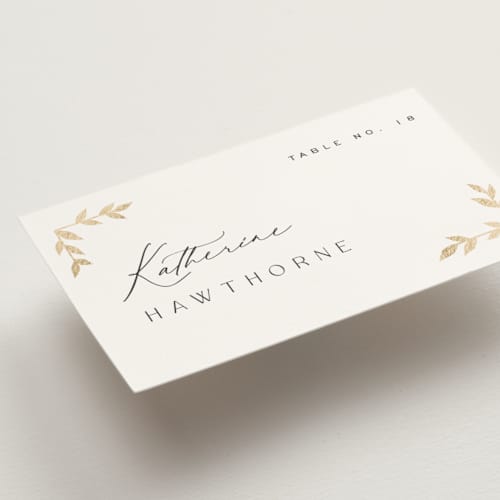 This is a lily wedding place cards with foil pressed by Owl and Toad called courtyard printing on signature in placecard