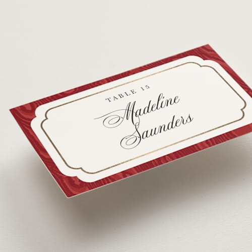 This is a crimson wedding place cards with foil pressed by Studio Suku called moiré printing on signature in placecard