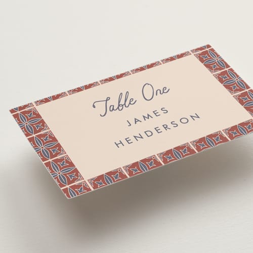 This is a terracotta wedding place cards with standard by Katharine Watson called block print tile printing on signature in placecard